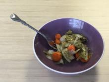 Carrots, cabbage, and leeks in bowl with fork
