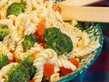 Blue bowl with pasta and broccoli