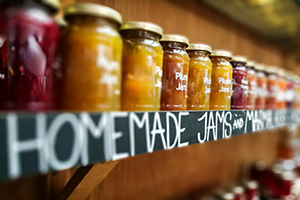 A line up of homemade jams on display