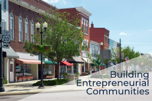 image of a small town's downtown buildings with text that reads Building Entrepreneurial Communities