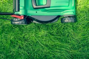 lawnmower over green grass