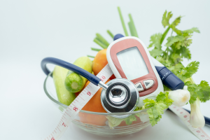 vegetables with diabetes monitor and stethoscope 