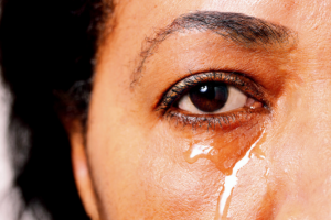 Woman with tears in eye