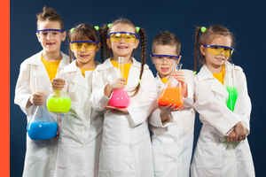 kids in lab coats holding flasks with colorful solutions in them