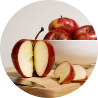 sliced apple on cutting board