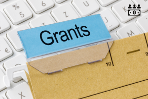 envelope with a sheet of paper with the word grants