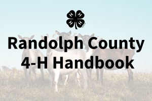 Goats with Randolph County 4-H Handbook text and 4-H cloverleaf emblem
