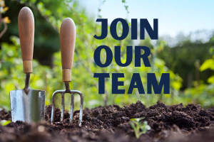 Garden tools in dirt with "Join Our Team" text