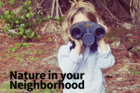child outdoors with binoculars