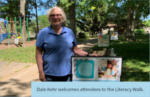 Dale Kehr welcomes attendees to the literacy walk