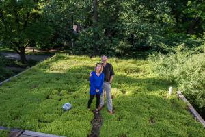 couple on their green roof structure