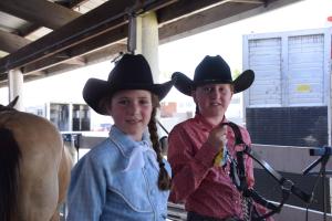 two girls in cowboy hats