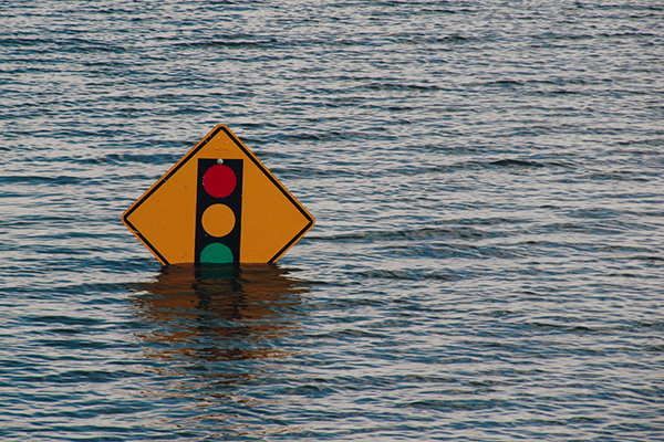 road sign under water