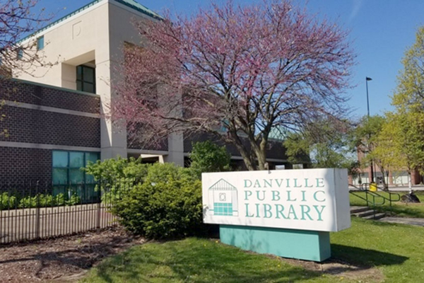 The front of the Danville Public Library and the sign.