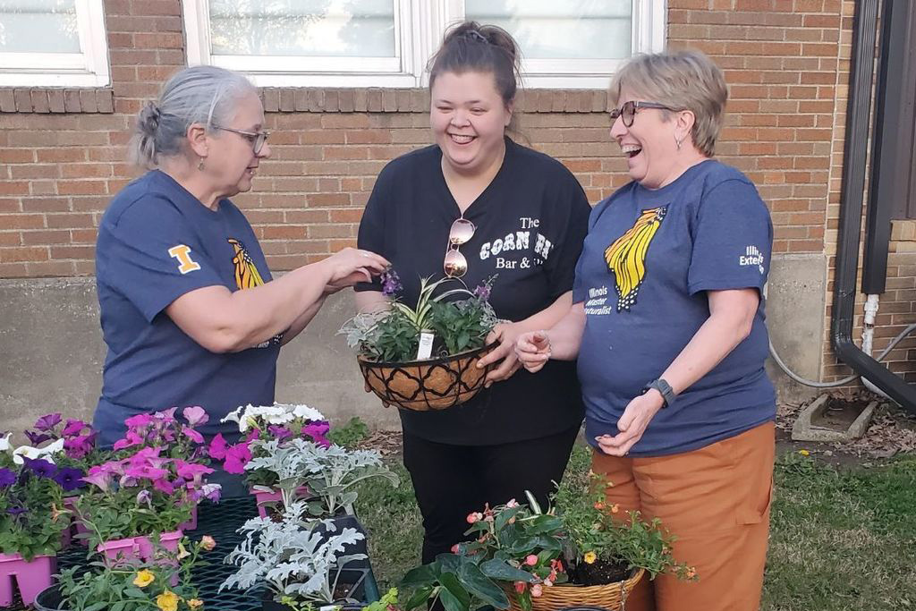 A group of women with plants