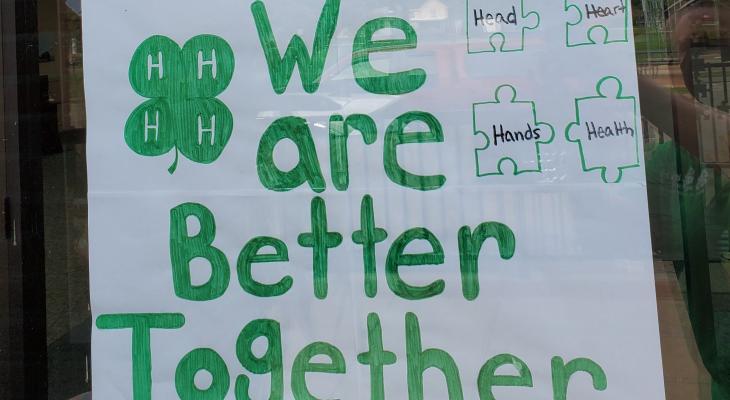 Sign of 4-H window display that says, "We Are Better Together"