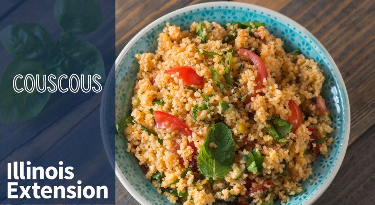 Bowl of couscous with slices of red bell peppers and basil