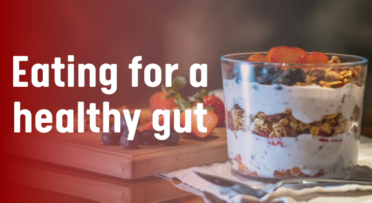 Text says "Eating for a healthy gut" with a picture of a yogurt parfait with yogurt, granola, and berries