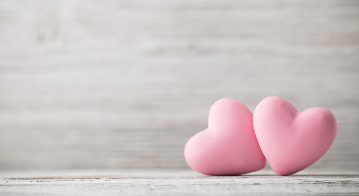 Gray background with two pink hearts side by side