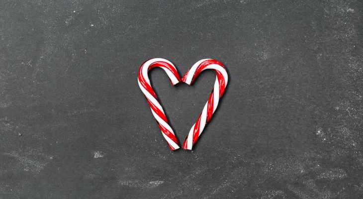 Two candy canes making a heart