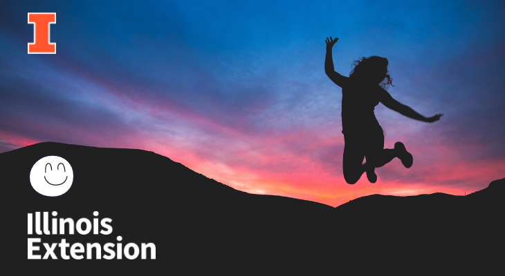 person jumping with joy in front of vibrant sunset