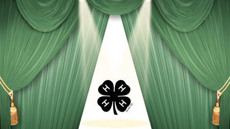 green stage curtains and 4-H Clover