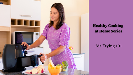 lady using air fryer in kitchen