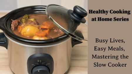 photo of a crockpot with beef, potatoes, carrots and broccoli in a brown gravy.