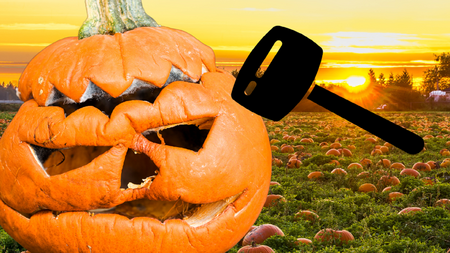 jack o'lantern in a field with sledgehammer graphic