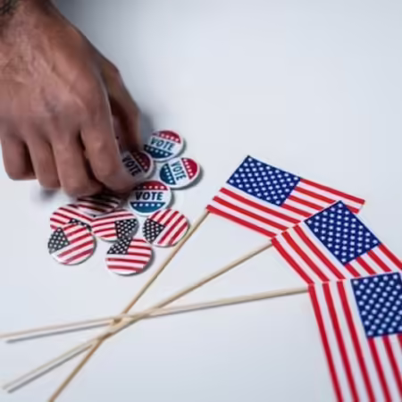 American flags and America buttons with a hand