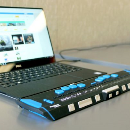 Laptop with accessible buttons