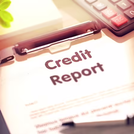 Credit report on clipboard