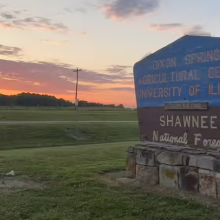 Sign at Dixon Springs Ag Center displaying the U.S. Forest Service and University of Illinois branding