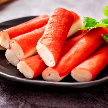 sticks of imitation crab on a plate