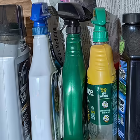 pesticide bottles on a shelf
