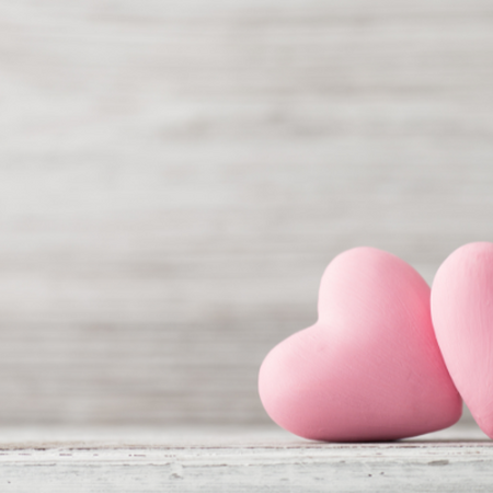 Gray background with two pink hearts side by side