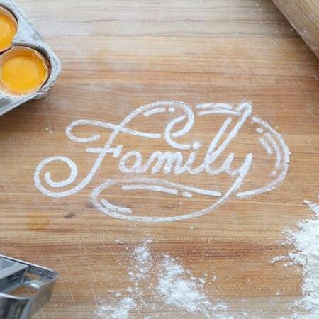 the word family written out in baking flour
