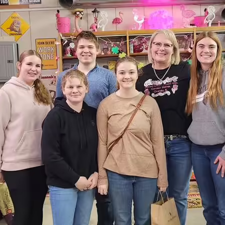 A group of people posing together