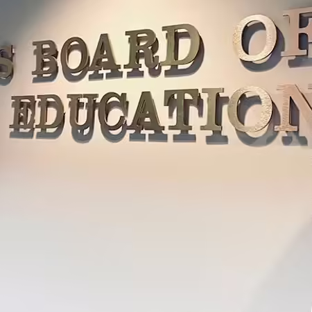 2023 ISPP Scholar MC Anderson stands by IBHE sign