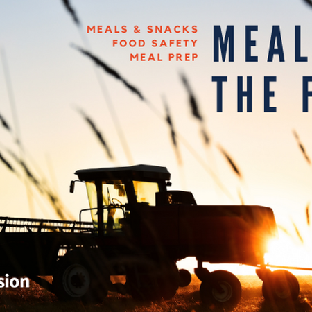 Farming combine in background with text in foreground reading Meals in the Field