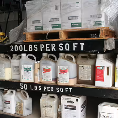 pesticide containers on a shelf