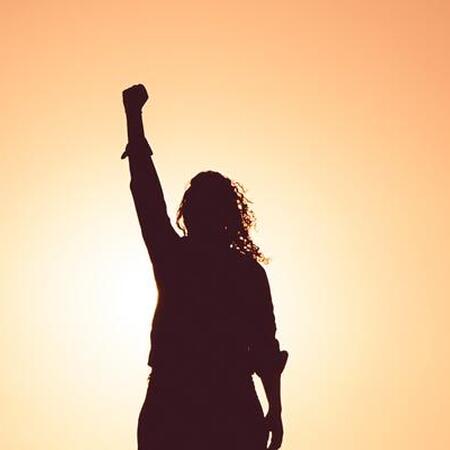 woman with fist in air