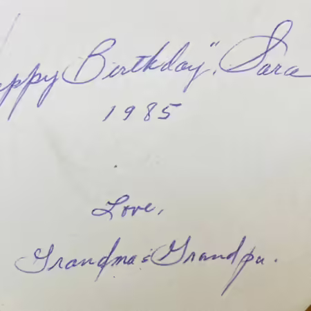 Handwritten message - Happy birthday Sara 1985 Love Grandma and Grandpa