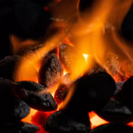 Coal burning with orange flames