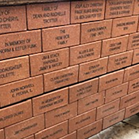wall of engraved bricks
