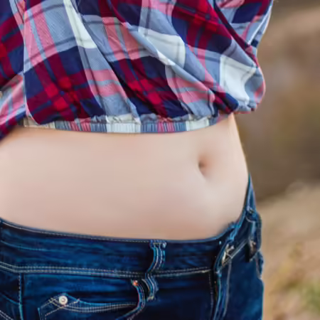 White women in crop top shirt