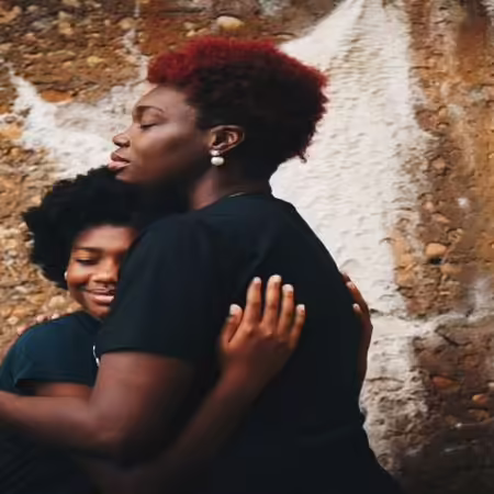 mother hugging her child