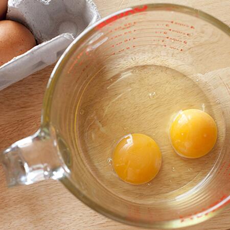 eggs in a bowl with egg carton