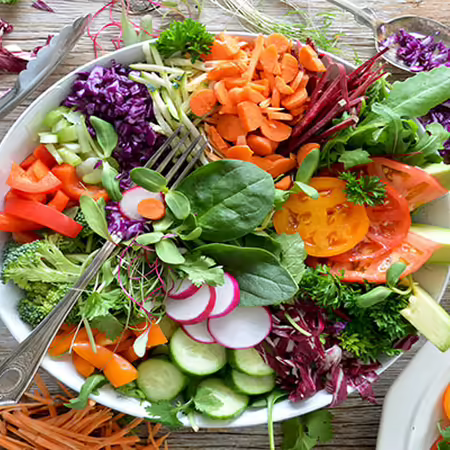 plate with a colorful vegetable salad