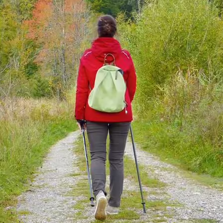 woman walking on a trail